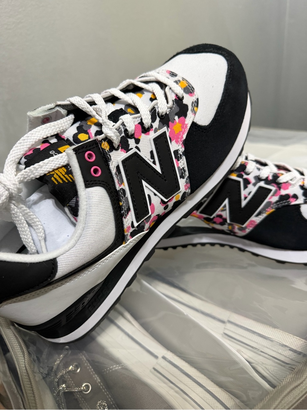 New Balance Women's Black, White & Pink Floral Accent Athletic Sneakers